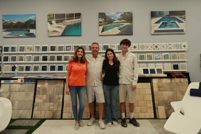 Next Level Pools and Spas owners at their showroom